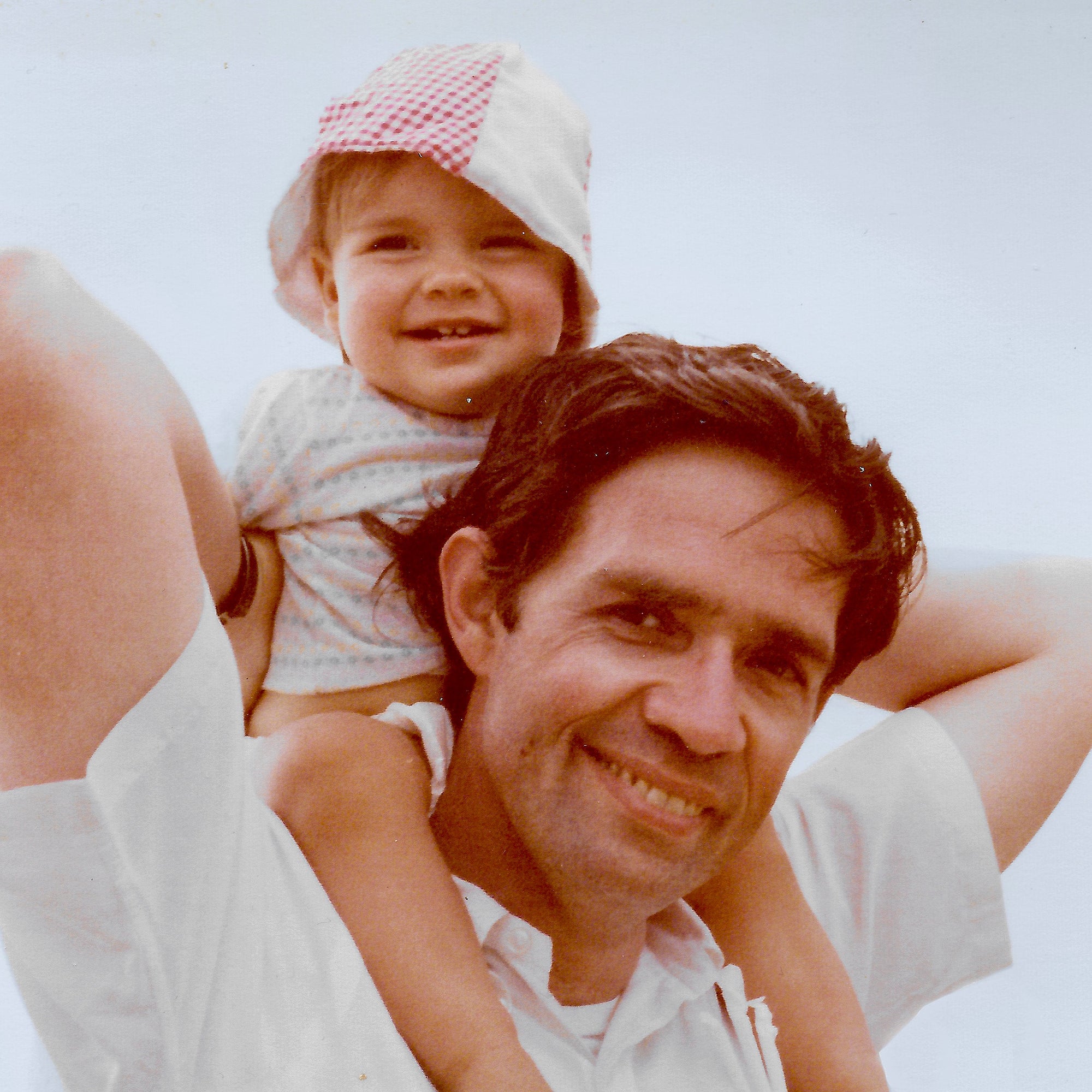 Baby Clare on Dad's shoulders