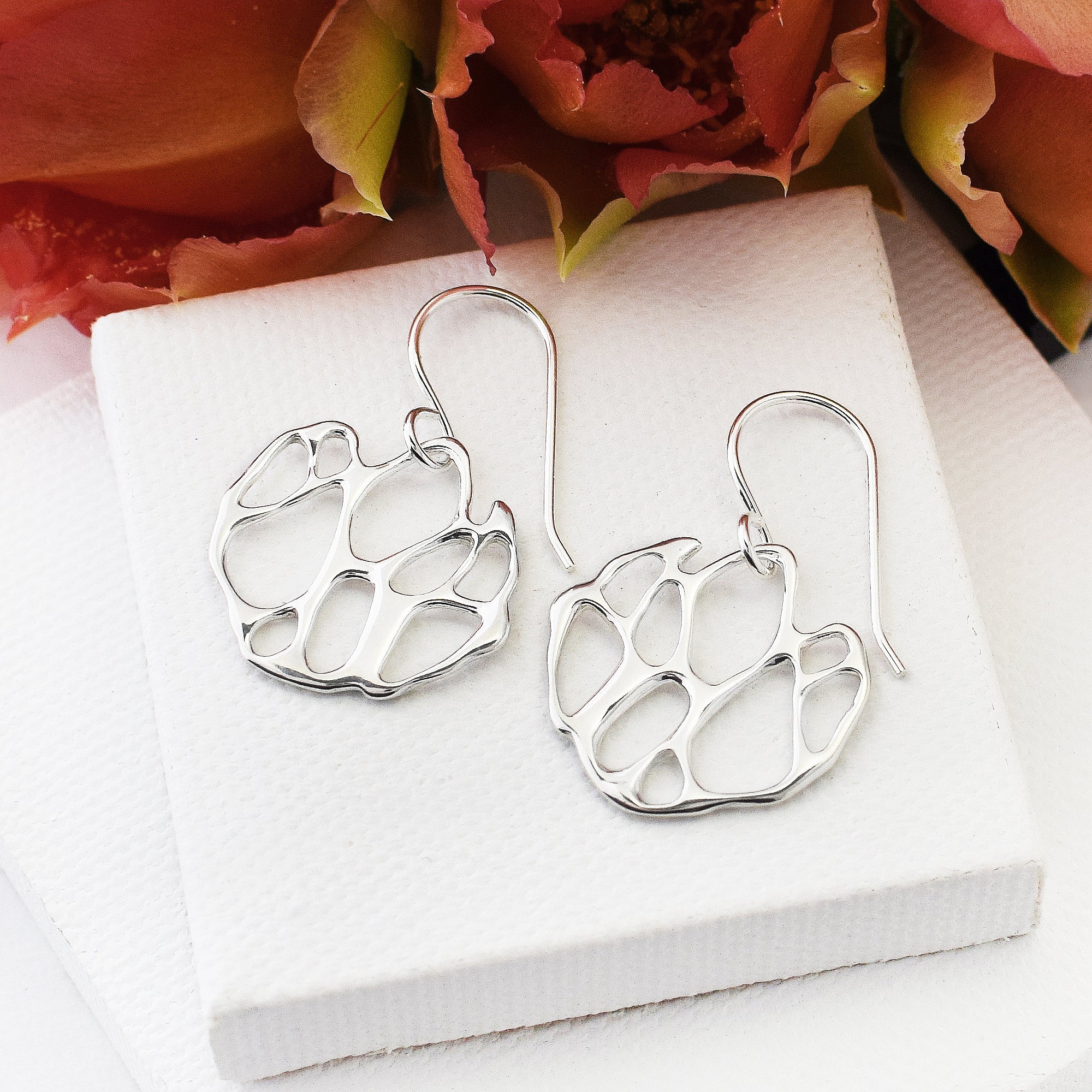 sterling silver cactus earrings on white