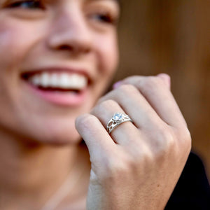 botanic silver solitaire ring on woman's finger