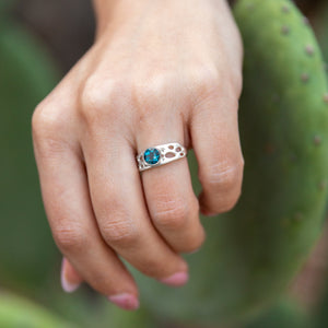 silver botanical solitaire ring with blue topaz